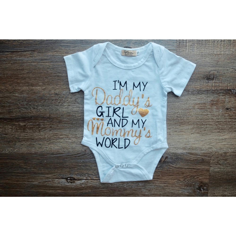 NWOT | baby girl onsie with black & gold writing